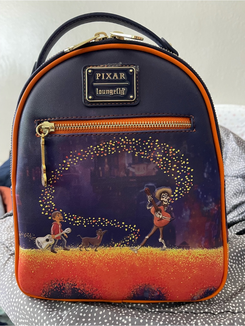 Loungefly Pixar Coco Mini Backpack – Navy and Orange